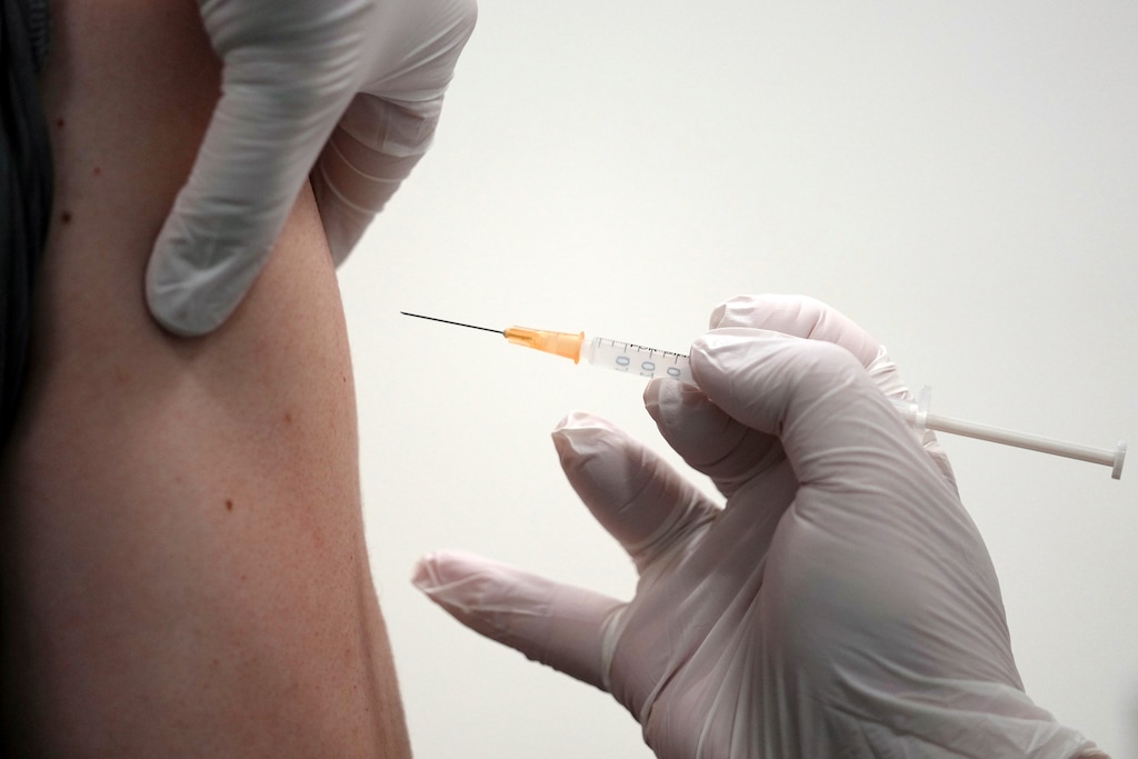 (Eugene Hoshiko | AP) The Food and Drug Administration has approved updated COVID-19 vaccines.
