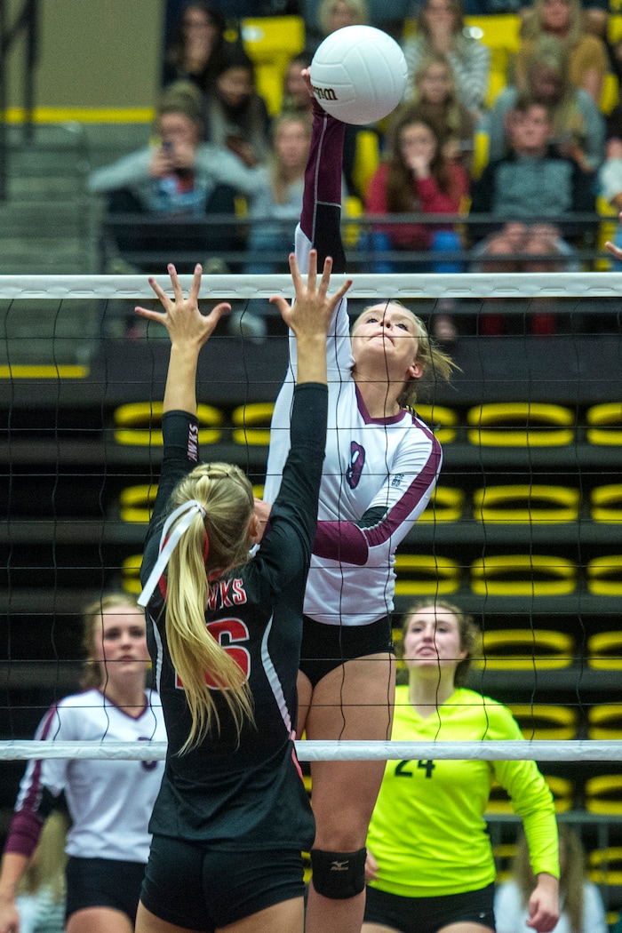 (Chris Detrick  |  The Salt Lake Tribune)  Morgan's Marcie Stapley (9) spikes past North Sanpete's Kelsie Nielson (16) during the the 3A volleyball state championships at the UCCU Center at Utah Valley University Thursday, October 26, 2017.  Morgan defeated North Sanpete 3-0.