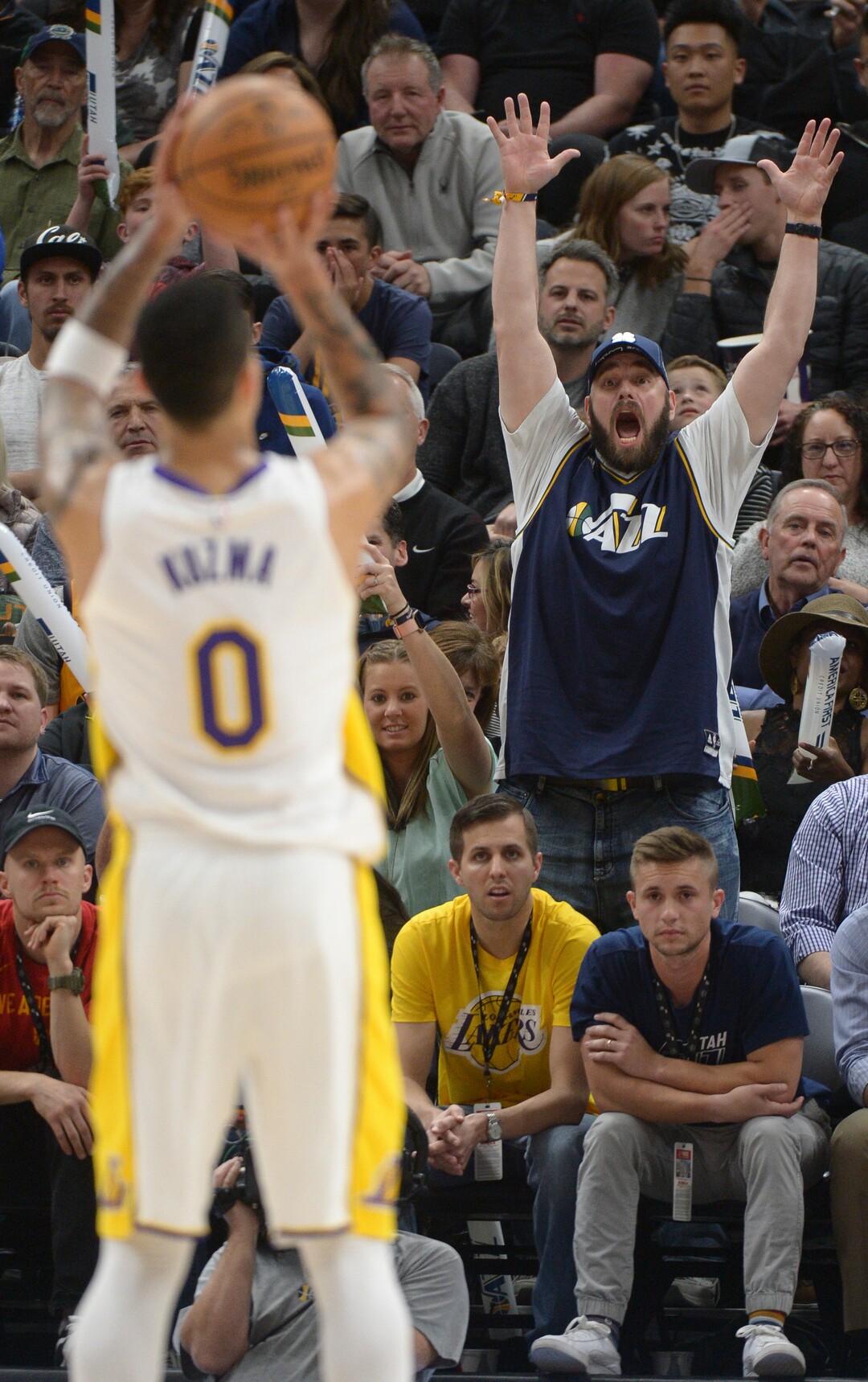 (Leah Hogsten  |  The Salt Lake Tribune) A Jazz fan tries to throw Los Angeles Lakers forward Kyle Kuzma (0) off his game at the foul line as the Utah Jazz host the Los Angeles Lakers at Vivint Smart Home Arena Tuesday, April 3, 2018