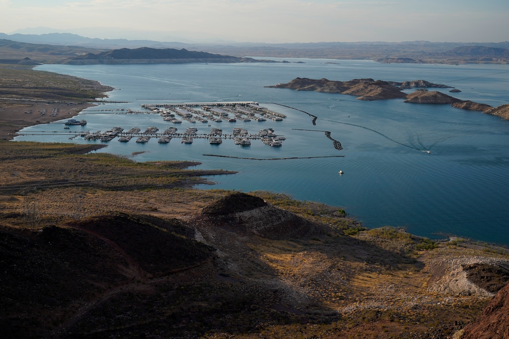 (John Locher | AP file photo) Boats fill slips at a marina on Lake Mead at the Lake Mead National Recreation Area, Thursday, Aug. 13, 2020, near Boulder City, Nev. The U.S. Bureau of Reclamation is expected to release projections that suggest the levels in Lake Powell and Lake Mead dipped slightly compared with last year.