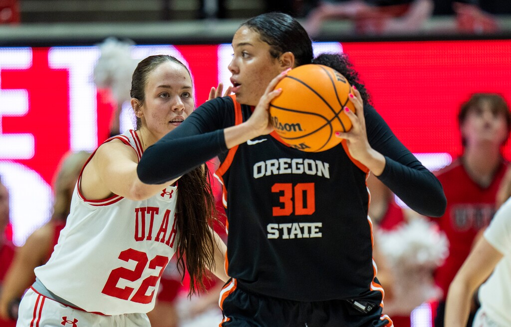 (Rick Egan | The Salt Lake Tribune)  Utah Utes forward Jenna Johnson (22) guards Oregon State Beavers forward Timea Gardiner (30), in PAC-12 basketball action between the Utah Utes and the Oregon State Beavers, at the Jon M. Huntsman Center, on Friday, Feb. 9, 2024.