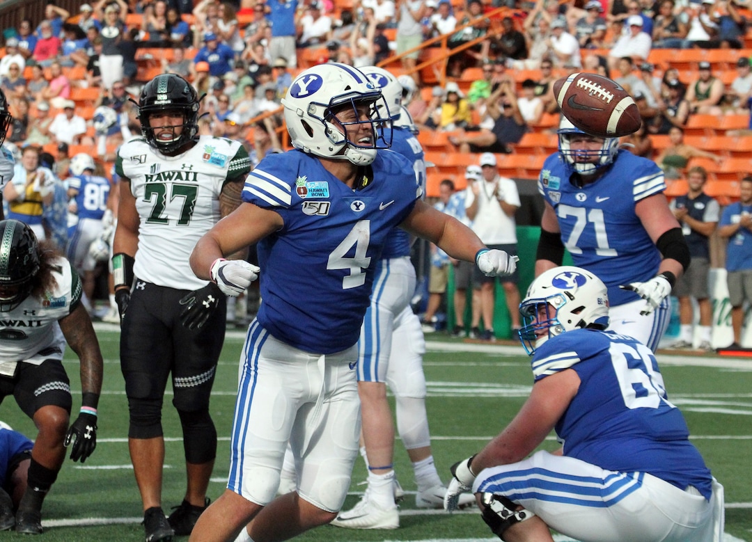 December 24, 2019 - Brigham Young Cougars running back Lopini Katoa (4) celebrates as he scored on a short touchdown lunge during a game at the SoFi Hawaii Bowl between the Brigham Young Cougars and the Hawaii Rainbow Warriors at the Stan Sheriff Center in Honolulu, HI - Michael Sullivan/CSM(Credit Image: &copy; Michael Sullivan/CSM via ZUMA Wire) (Cal Sport Media via AP Images)