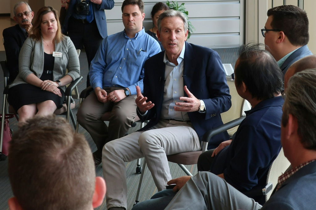 (AP Photo | John Hanna) Former Starbucks CEO Howard Schultz, center, speaks about the possibility that he'll run for president as an independent candidate during a town hall meeting on the University of Kansas campus in Lawrence, Kansas. Schultz believes he would take much of his support from disaffected Republicans.
