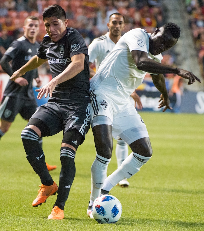 (Rick Egan  |  The Salt Lake Tribune) 
Real Salt Lake forward Jefferson Savarino (7) goes for the ball along with Colorado Rapids defender Edgar Castillo (2), in MLS soccer action, between Real Salt Lake and Colorado Rapids,  at Rio Tinto Stadium, Saturday, April 21, 2018.



