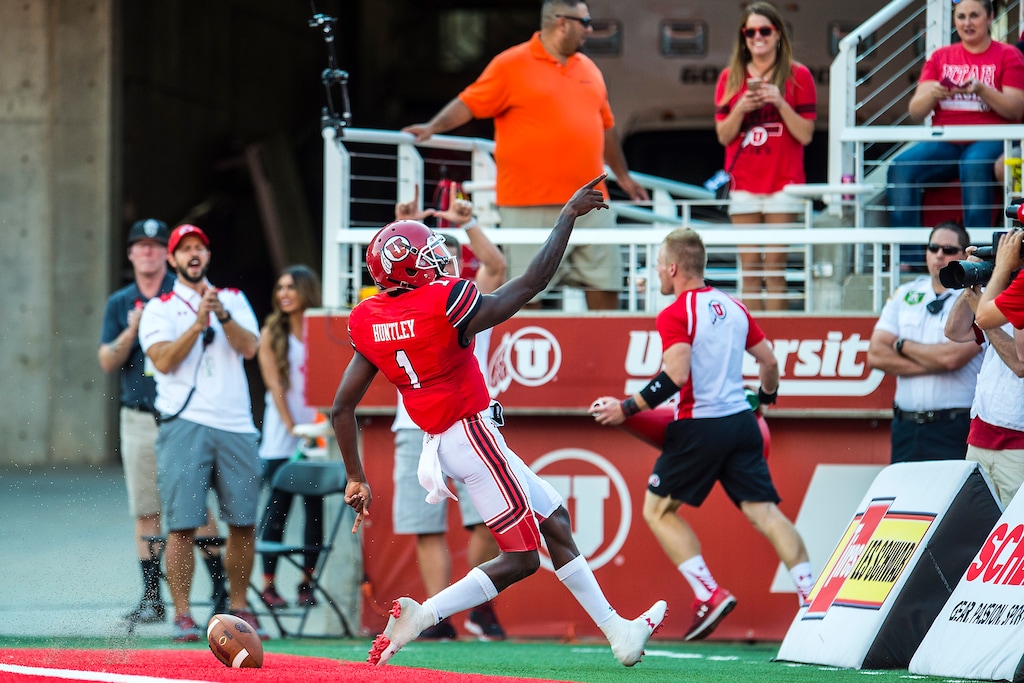 (Chris Detrick  |  The Salt Lake Tribune)  Utah Utes quarterback Tyler Huntley (1) celebrates his touchdown during the game at Rice-Eccles Stadium Thursday, August 31, 2017. Utah Utes are leading North Dakota Fighting Hawks 17-9 at halftime. 