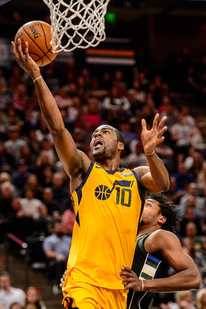 (Trent Nelson | The Salt Lake Tribune)  Utah Jazz guard Alec Burks (10) scores as the Utah Jazz host the Milwaukee Bucks, NBA basketball in Salt Lake City Saturday November 25, 2017.