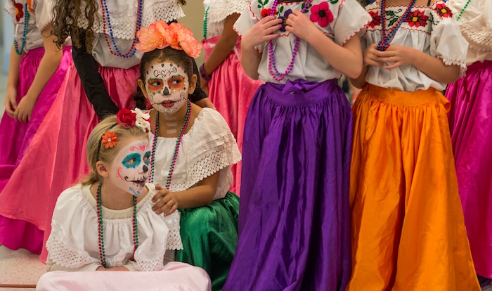 (Leah Hogsten | The Salt Lake Tribune) The Arte Primero dancers prepare to dance as part of the Day of the Dead festival Saturday, October 21, 2017 at the Capitol.