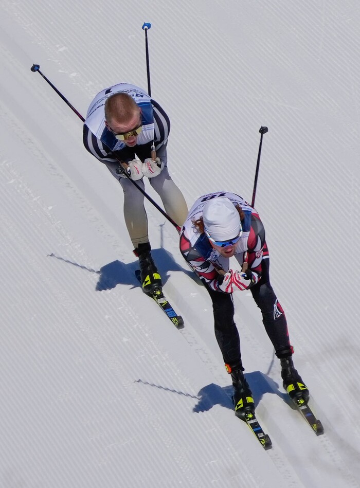 (Francisco Kjolseth | The Salt Lake Tribune) Bjorn Riksaasen, right,  of the University of Utah competes in the men’s 10K classic during the NCAA Skiing Championships held at the Soldier Hollow Nordic Center on Thursday, March 10, 2022 in Midway, Utah. 