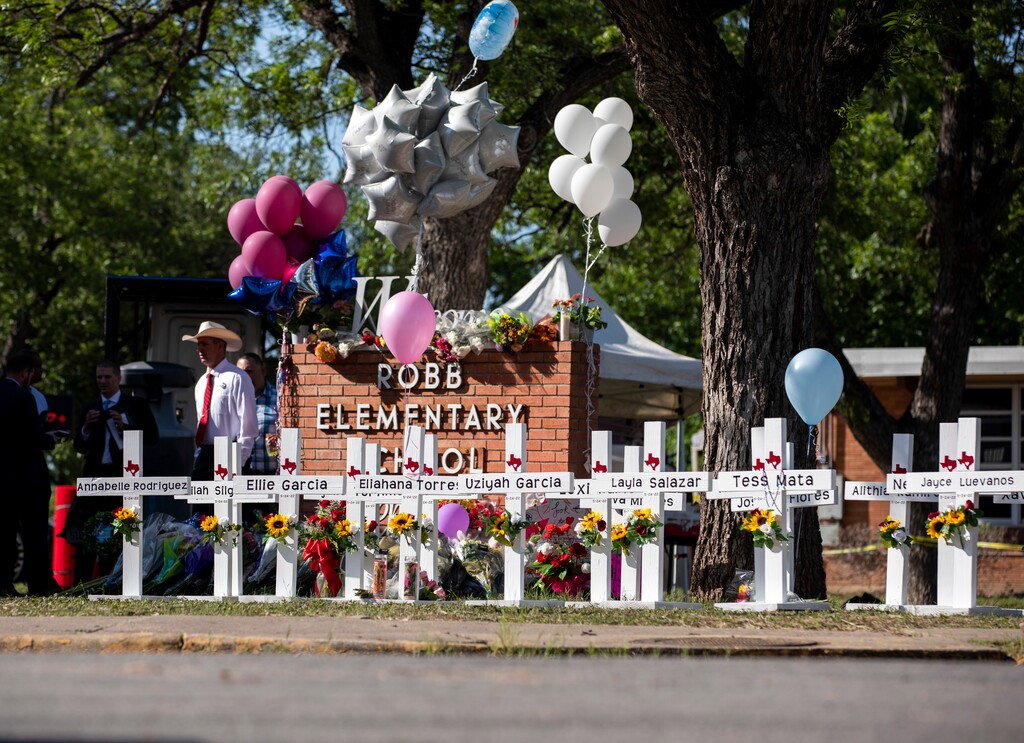 (Ivan Pierre Aguirre | The New York Times)

Newly-added crosses bear the names of those killed in Tuesday's mass shooting at Robb Elementary School in Uvalde, Texas, on Thursday, May 26, 2022. Thursday was supposed to have been the last day of school in Uvalde; instead, grieving relatives are planning funerals after a mass shooting for which investigators were still seeking a motive.