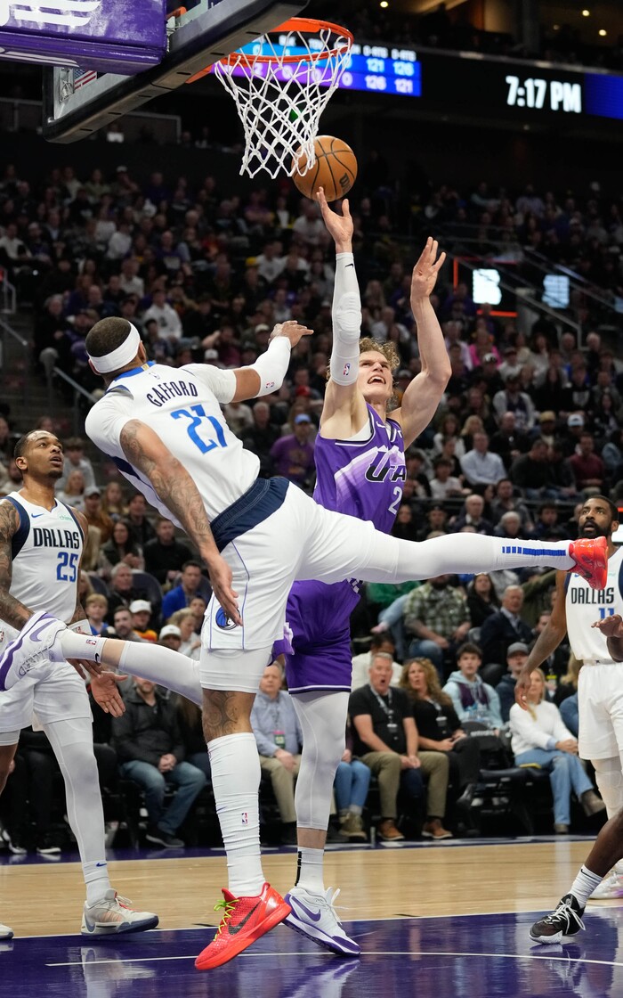 (Francisco Kjolseth  |  The Salt Lake Tribune) Utah Jazz forward Lauri Markkanen (23) shoots over Dallas Mavericks center Daniel Gafford (21) during an NBA basketball game Monday, March 25, 2024, in Salt Lake City.