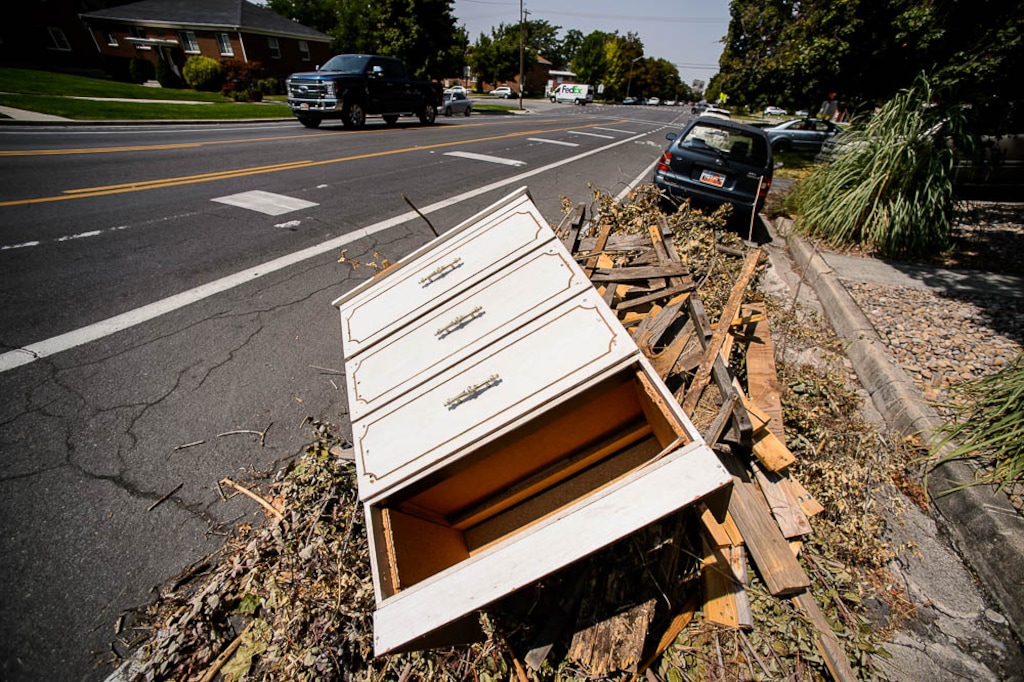 (Trent Nelson | The Salt Lake Tribune)A roadside pile of debris at approximately 800 East 300 South in Salt Lake City, Friday Aug. 3, 2018.