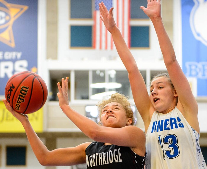 (Trent Nelson | The Salt Lake Tribune)  Northridge's Brooklyn Perkins (3) drives with Bingham's Kasia Higgins (13) defending as Bingham faces Northridge in the 6A High School Girls' Basketball Tournament at SLCC in Taylorsville, Thursday Feb. 22, 2018.