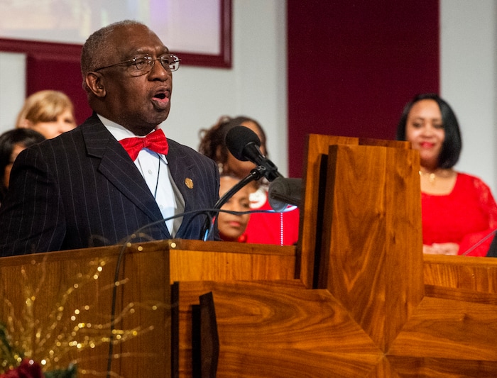 (Rick Egan  |  The Salt Lake Tribune)   Rev. France Davis welcomes at the congregation at the beginning of the early morning service at Calvary Baptist Church, Sunday, Dec. 22, 2019.