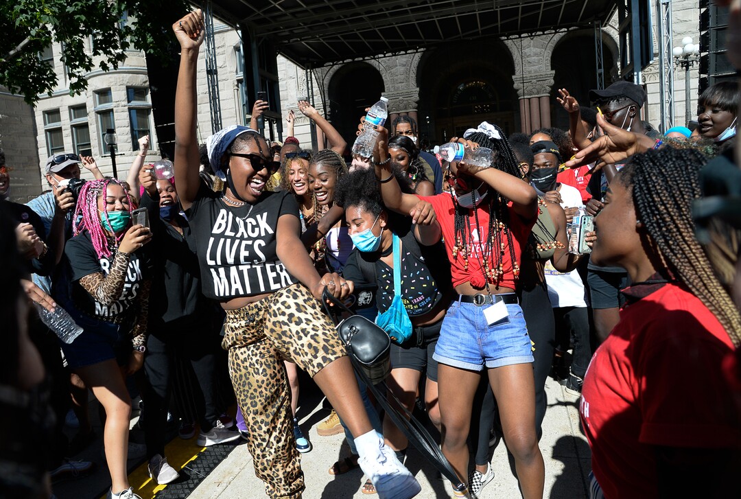 (Francisco Kjolseth  |  The Salt Lake Tribune) Revelers dance during the Juneteenth celebration at Washington Square in Salt Lake City on Friday, June 19, 2020.