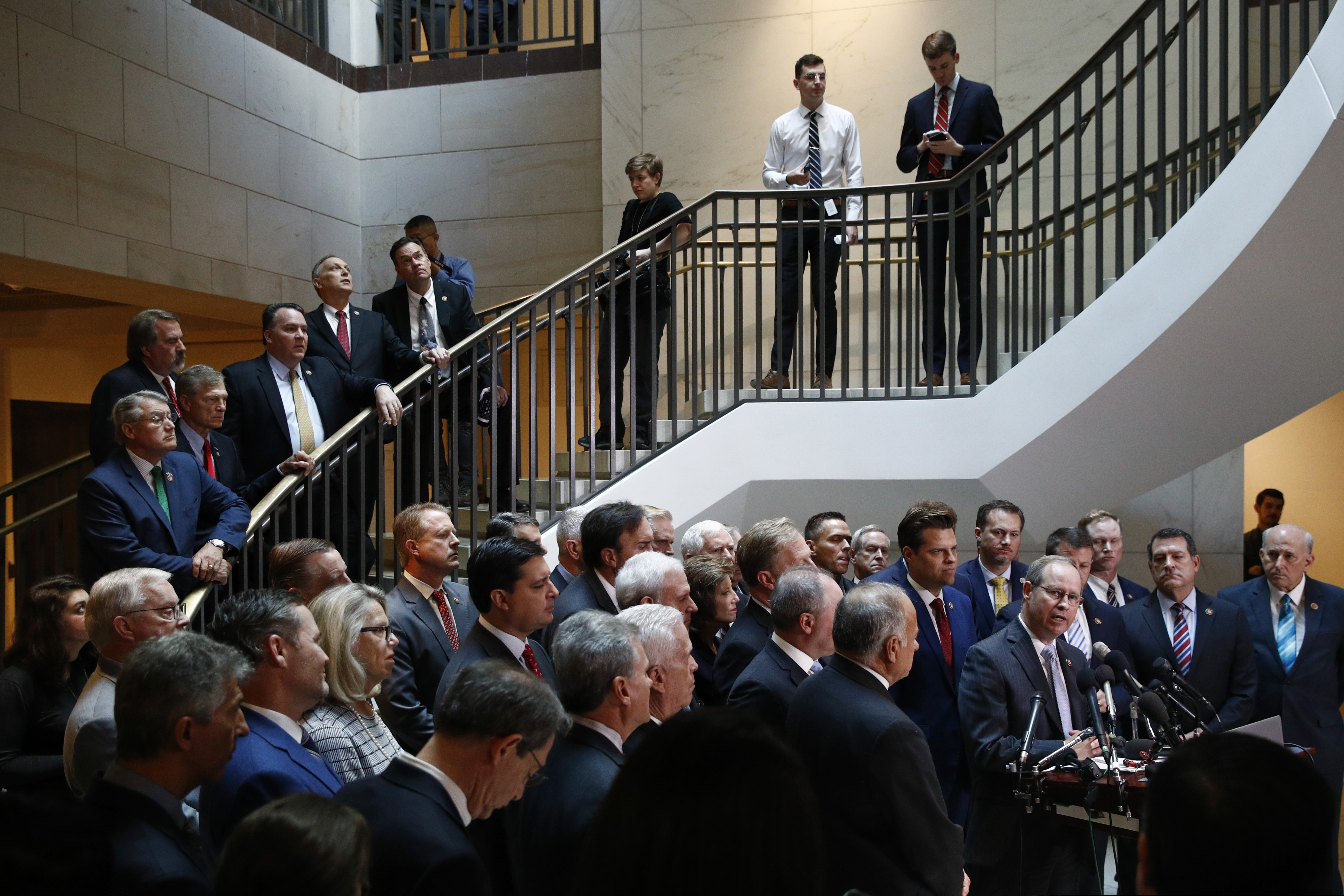 (Patrick Semansky | AP) House Republicans gather for a news conference after Deputy Assistant Secretary of Defense Laura Cooper arrived for a closed door meeting to testify as part of the House impeachment inquiry into President Donald Trump, Wednesday, Oct. 23, 2019, on Capitol Hill in Washington.