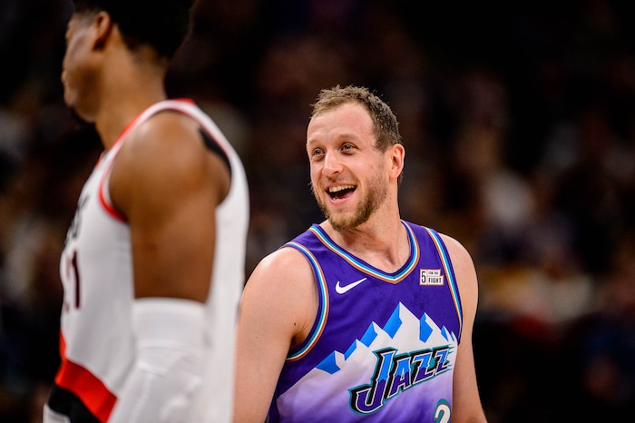 (Trent Nelson  |  The Salt Lake Tribune) Utah Jazz forward Joe Ingles (2) smiles toward Portland Trail Blazers center Hassan Whiteside (21) after being called for a technical foul as the Utah Jazz host the Portland Trail Blazers, NBA basketball in Salt Lake City on Thursday, Dec. 26, 2019.