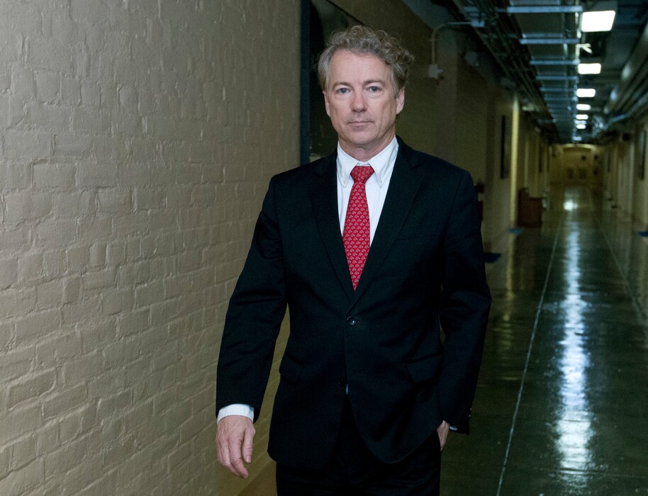Sen. Rand Paul, R-Ky., walks to his office after speaking in the senate floor, at the Capitol, Thursday, Feb. 8, 2018, in Washington. (AP Photo/Jose Luis Magana)