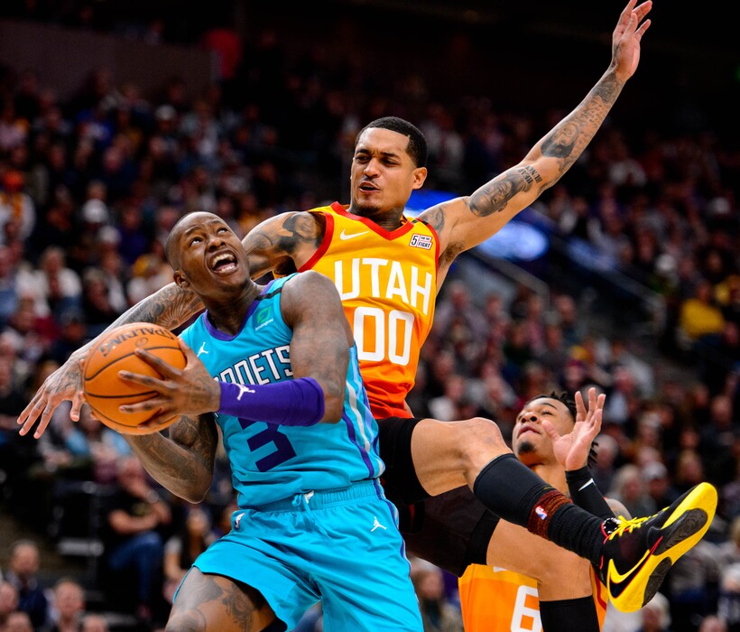 (Trent Nelson | The Salt Lake Tribune) Utah Jazz guard Jordan Clarkson (00) defending Charlotte Hornets guard Terry Rozier (3) as the Utah Jazz host the Charlotte Hornets, NBA basketball in Salt Lake City on Friday, Jan. 10, 2020.