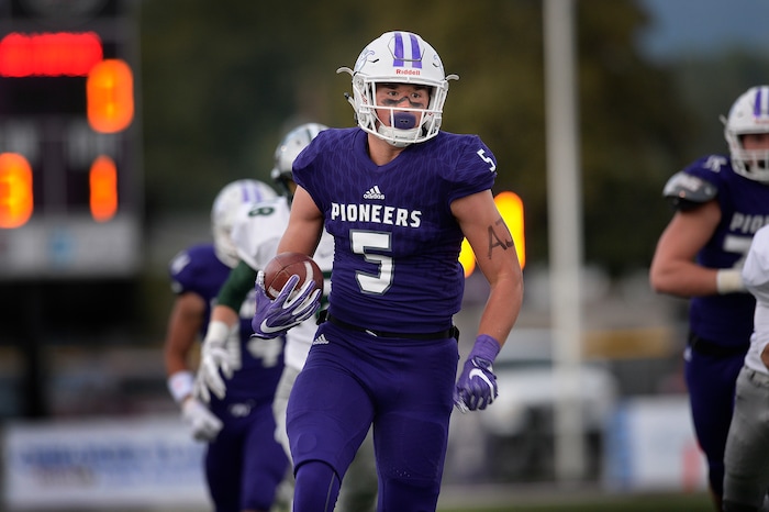 (Scott Sommerdorf   |  The Salt Lake Tribune)   Lehi TE Dallin Holker runs after a catch during first half play. Lehi led Olympus 26-0 late in the second half, Friday, September 22, 2017.