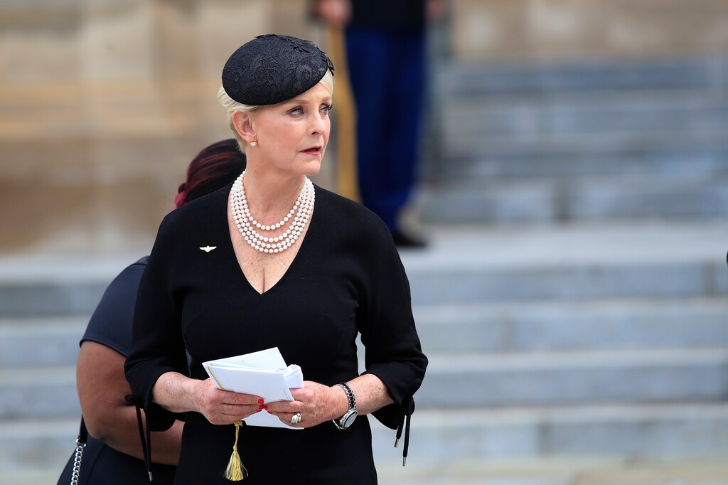 FILE - In this Sept. 1, 2018, file photo, Cindy McCain, glances back towards the hearse carrying her husband's casket, following a memorial service for her husband Sen. John McCain, R-Ariz., at the Washington National Cathedral in Washington. A nonprofit named for the late Sen. John McCain is calling for “mavericks” like him to vote in the Nov. 6 election and focus on human rights around the world. The McCain Institute for International Leadership, led by his widow, Cindy, is launching a nonpartisan campaign Tuesday, Oct. 23, to spread that message especially to young Americans.  (AP Photo/Manuel Balce Ceneta, File)