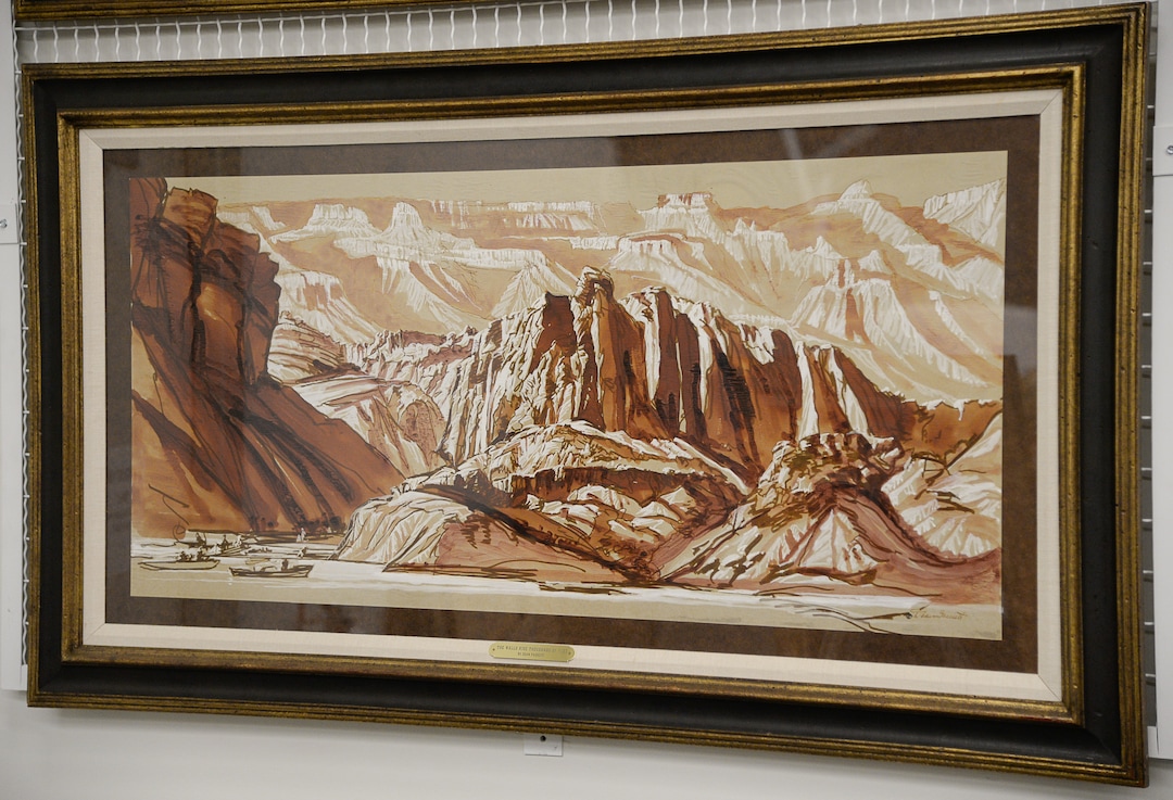 (Francisco Kjolseth  |  The Salt Lake Tribune)  Anthropology collections staff from the Natural History Museum of Utah show off and discuss several newly acquired cultural artifacts collected by John Wesley Powell, well known in Utah for his famed Colorado River expeditions in1869 and during 1871-1872. Included are several original sepia water color and ink drawings by noted American painter and Utah artist Dean Fausett whoillustrated the Powell expeditions. 