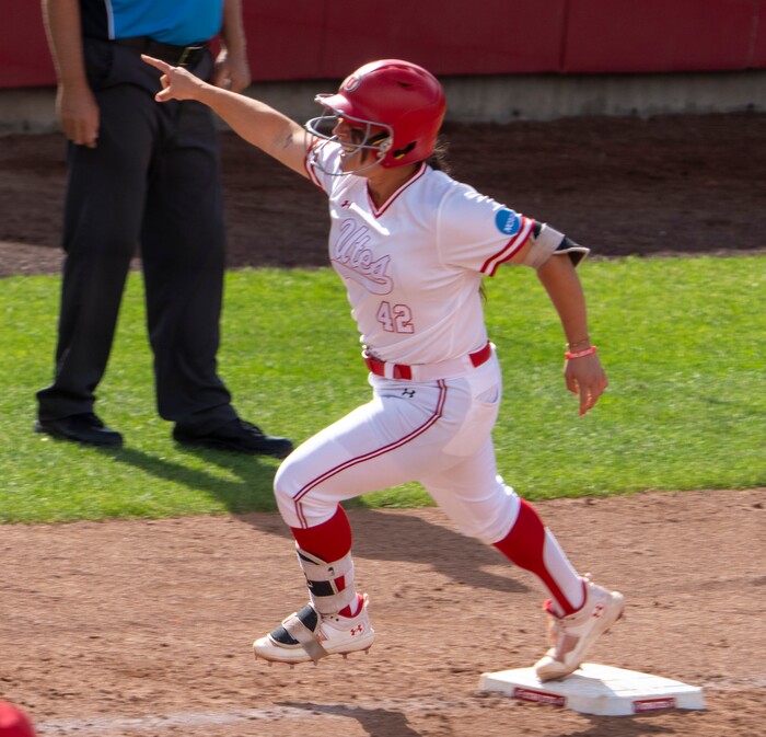 (Rick Egan | The Salt Lake Tribune)  Julia Jimenez celebrates rounds third after hitting a grand slam home run, giving Utah a 7-1 lead, in NCAA Softball Super Regionals action between the Utah Utes and the San Diego State Aztecs, on Saturday, May 27, 2023.

