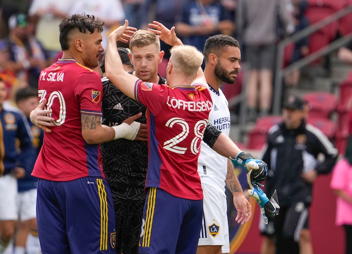 (Leah Hogsten | The Salt Lake Tribune) l-r Real Salt Lake defender Marcelo Silva (30), Real Salt Lake goalkeeper Zac MacMath (18) and Real Salt Lake defender Jasper Lffelsend (28) celebrate the win against LA Galaxy at Rio Tinto Stadium, Saturday, April 30, 2022. Real Salt Lake defender Marcelo Silva (30) scored the one goal to win the match 1-0.