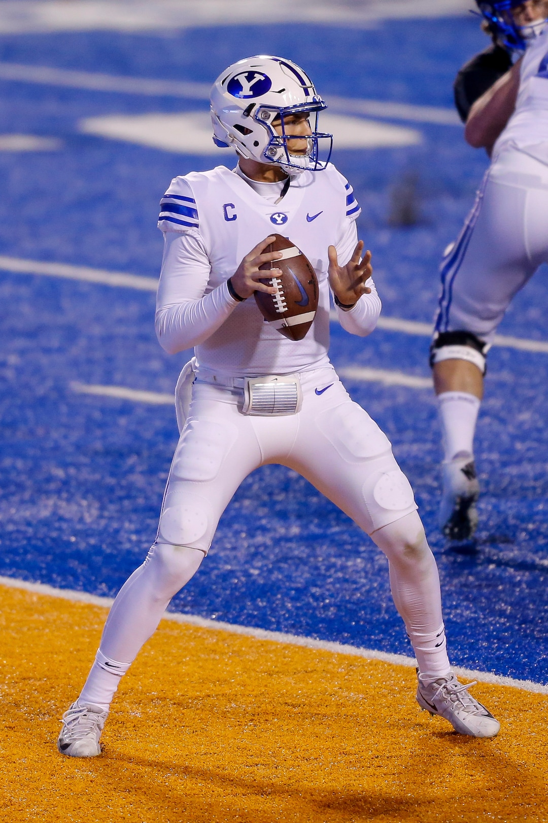 BYU quarterback Zach Wilson (1) looks for a receiver during the first half of the team's NCAA college football game against Boise State on Friday, Nov. 6, 2020, in Boise, Idaho. (AP Photo/Steve Conner)
