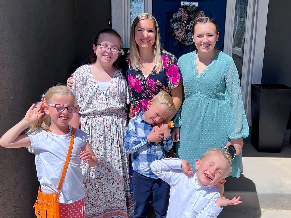 (Tina Brown) Tausha Haight is surrounded by her five children in an undated photograph. Tausha, her mother, and children were shot dead by her husband, Michael Haight on Wednesday, Jan. 4, 2023, before killing himself, according to officials.