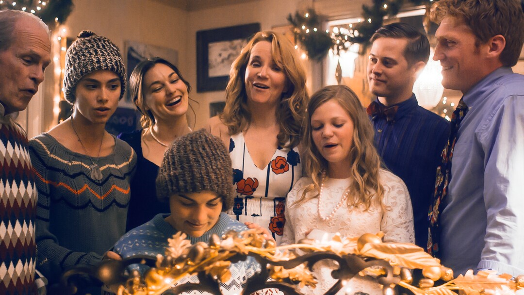 (Photo courtesy Pinnacle Peak Pictures) Beth (Allie Jennings, foreground) plays piano while family and friends — from left, Mr. Laurence (Michael Flynn), Jo (Sarah Davenport), Meg (Melanie Scott), Marmee (Lea Thompson), Amy (Elise Jones), Laurie (Lucas Grabeel) and Mr. March (Bart Johnson) — in director Clare Niederpruem's modern-day adaptation of Louisa May Alcott's "Little Women."