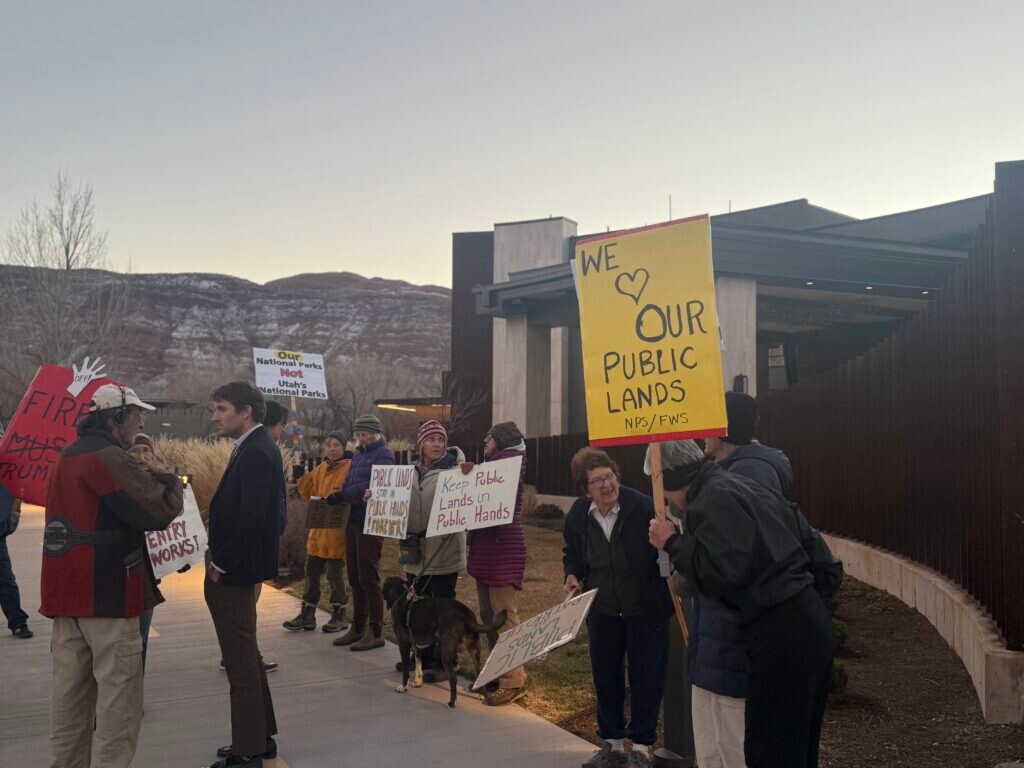 (Lizzie Ramirez | The Times-Independent) Protesters gather outside of Hoodoo Moab, where a private reception was held for Kevin Lilly, acting assistant secretary for the Department of Interior Fish, Wildlife and National Parks, on Jan. 15.