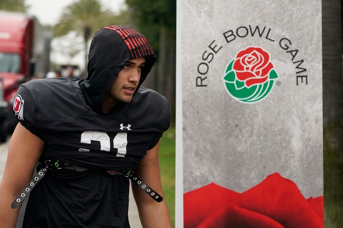 (Marcio Jose Sanchez | AP) Utah linebacker Karene Reid walks to practice ahead of the Rose Bowl NCAA college football game against Penn State, Friday, Dec. 30, 2022, in Carson, Calif.