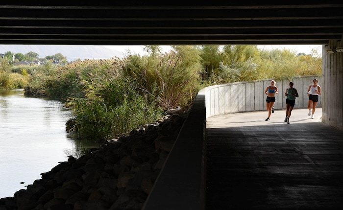 (Francisco Kjolseth  |  The Salt Lake Tribune) People recreate on the Jordan River Parkway in South Jordan on Friday, Oct. 2, 2020.