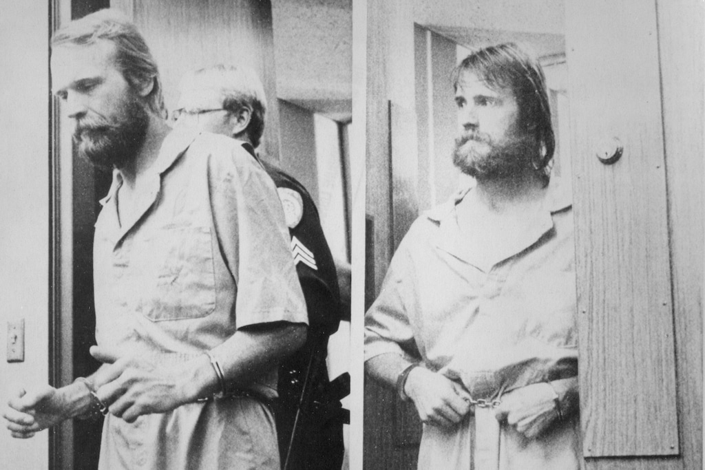 (AP file photo) Ron Lafferty, left, and his brother, Dan, were shackled as they appeared in Washoe District court for an extradition hearing in 1984.