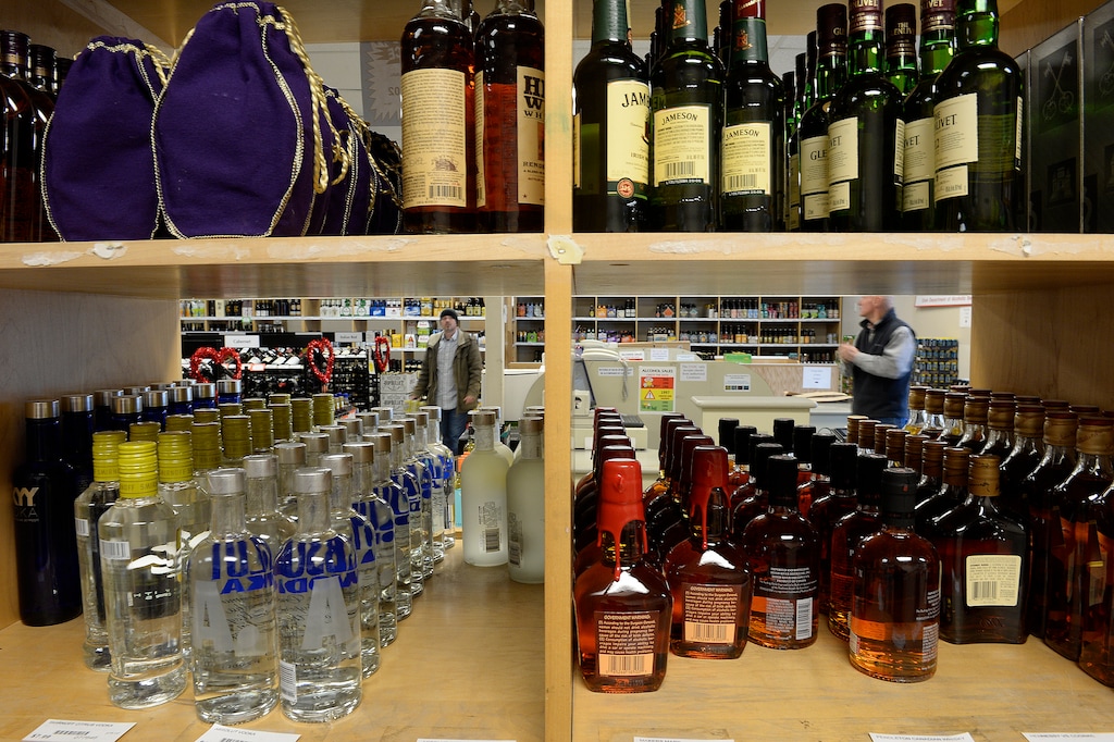 (Scott Sommerdorf | The Salt Lake Tribune) Looking through one of the sets of shelves at the state liquor store at 1615 Foothill Blvd. in Salt Lake City, Thursday, Feb., 15, 2018.