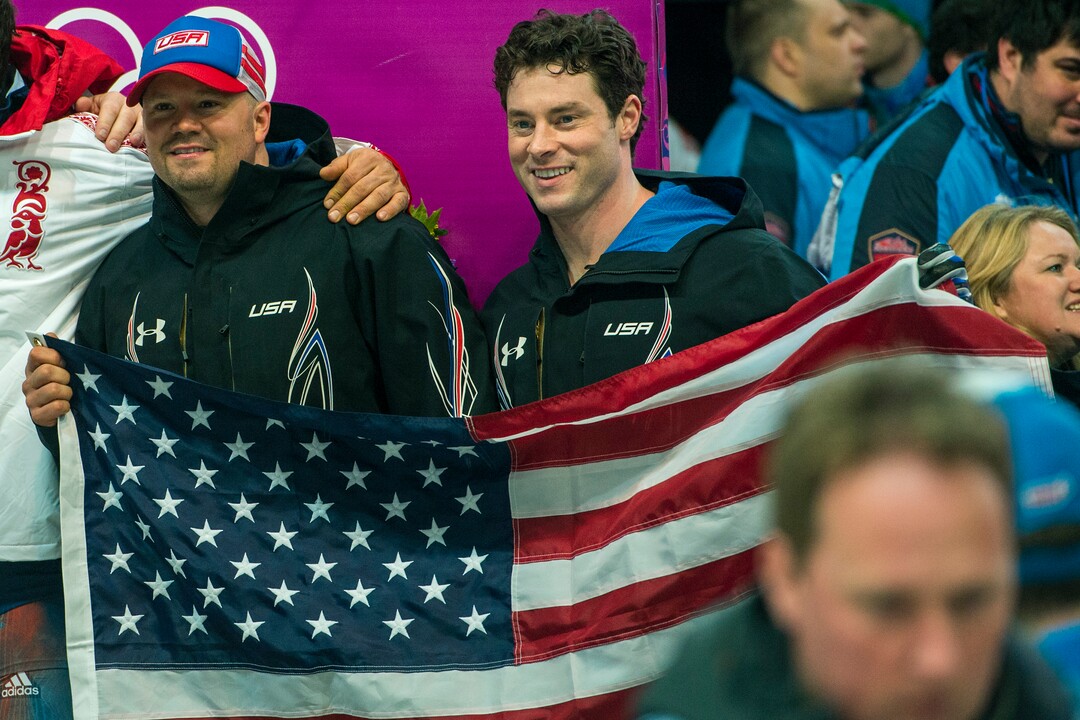 KRASNAYA POLYANA, RUSSIA  - JANUARY 17:Pilot Steven Holcomb, left, and brakeman Steven Langton, celebrate after competing in the men's two-man bobsled at Sanki Sliding Center during the 2014 Sochi Olympics Monday February 17, 2014. USA-1 with Steven Holcomb, of Park City, Utah, and Steve Langton, of Melrose, Mass., won the bronze medal with a time of 3:46.27.(Photo by Chris Detrick/The Salt Lake Tribune)