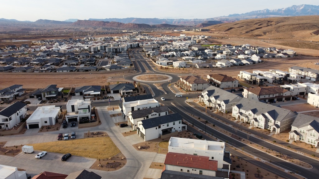 (Jud Burkett | Special to The Tribune) A variety of homes and condominiums in various states of construction near the Arizona-Utah state line in St. George, Thursday, March 20, 2025. A moderate-income housing program is intended to result in more housing options and variety like this neighborhood and more affordability to households earning 80% or less in the state’s biggest cities and counties.