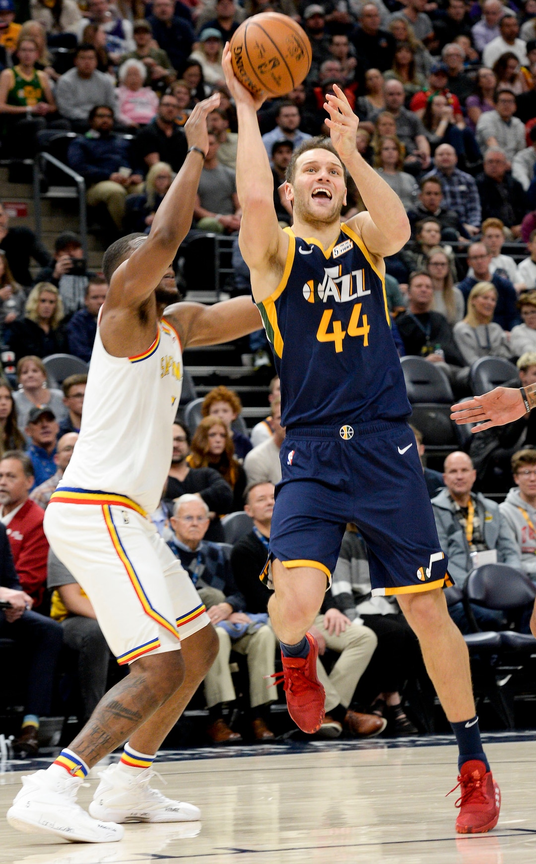 (Leah Hogsten  |  The Salt Lake Tribune) Utah Jazz forward Bojan Bogdanovic (44) hits the net as the Utah Jazz host the Golden State Warriors, Dec. 13, 2019 at Vivint Arena.