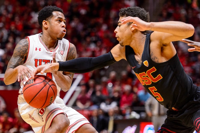 (Trent Nelson | The Salt Lake Tribune)  USC Trojans guard Derryck Thornton (5) steals the ball from Utah Utes guard Justin Bibbins (1) as the University of Utah hosts USC, NCAA basketball at the Huntsman Center in Salt Lake City, Saturday Feb. 24, 2018.