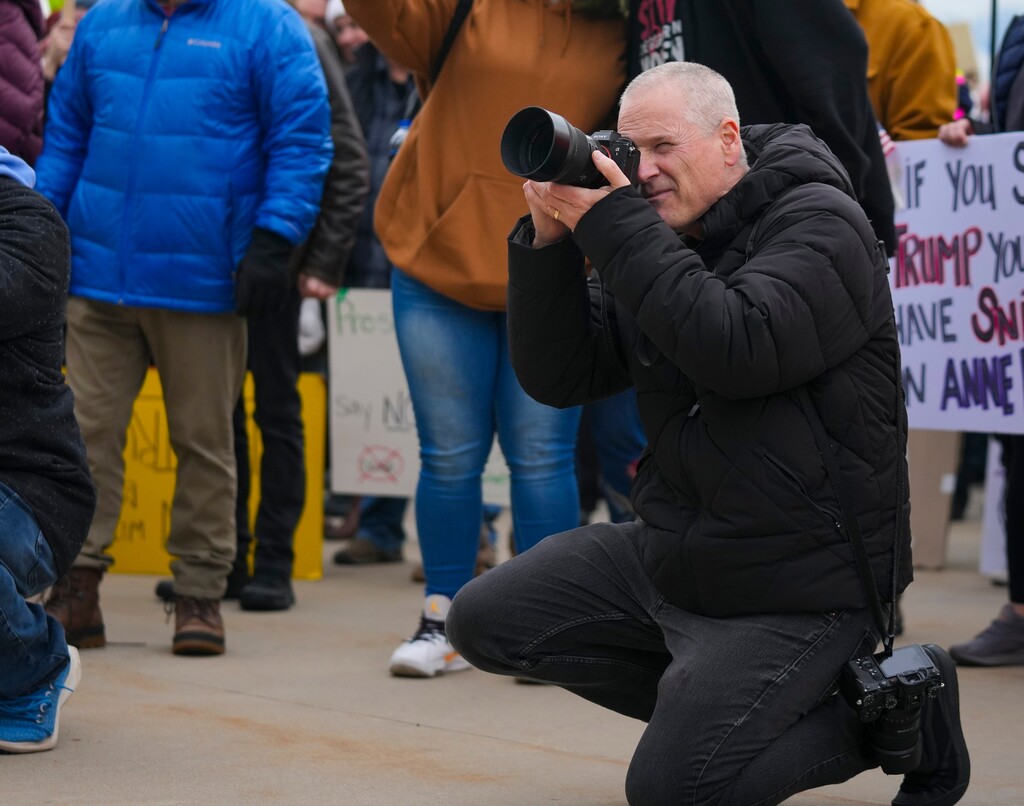 (Bethany Baker | The Salt Lake Tribune) Salt Lake Tribune visual journalist Trent Nelson photographs speakers during a protest at the Utah Capitol in Salt Lake City on Monday, Feb. 17.