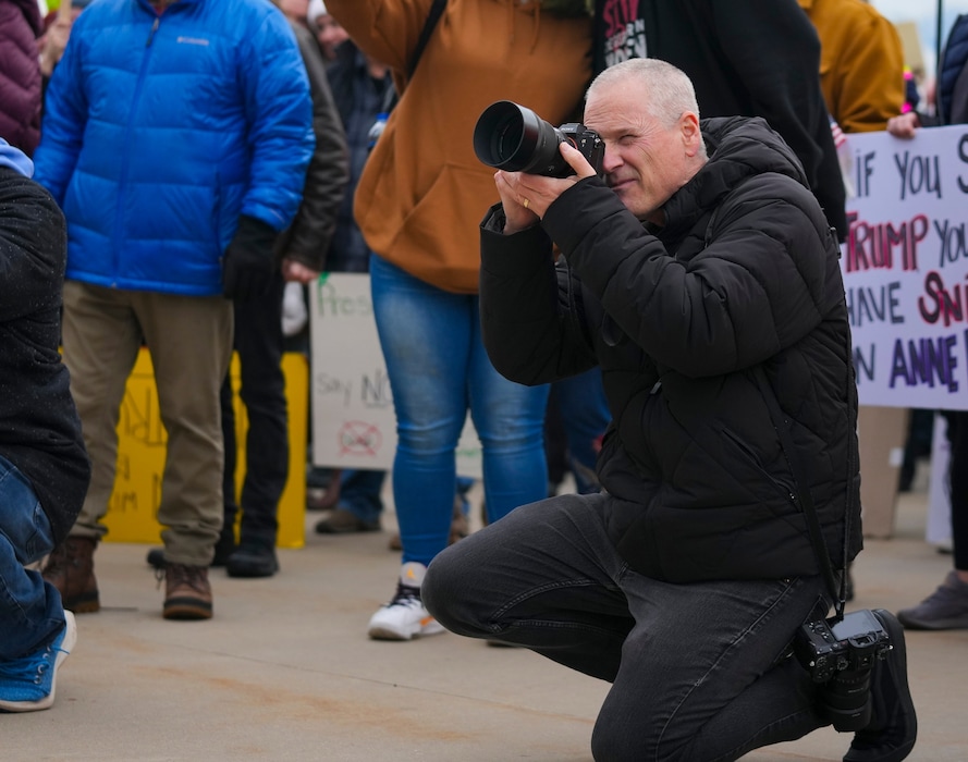 (Bethany Baker | The Salt Lake Tribune) Salt Lake Tribune visual journalist Trent Nelson photographs speakers during a protest at the Utah Capitol in Salt Lake City on Monday, Feb. 17.