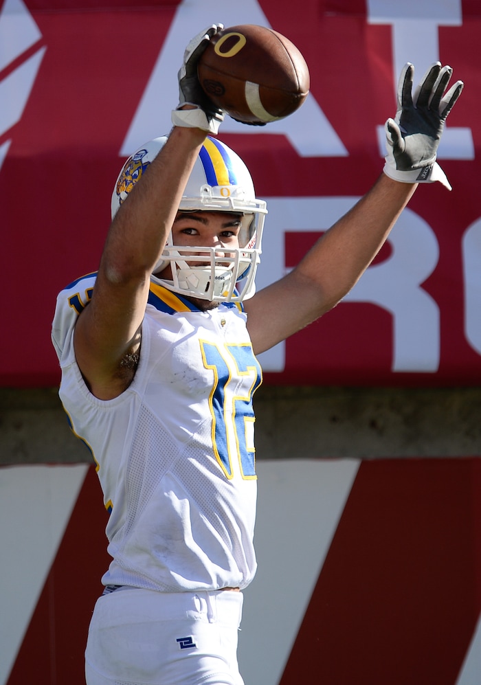 (Francisco Kjolseth  |  The Salt Lake Tribune)  Orem's Puka Nacua ties the state record for touchdowns at 25 during the first half of their game against Dixie in the 4A high school championship game at Rice Eccles Stadium in Salt Lake City, Friday, Nov. 16, 2018.
