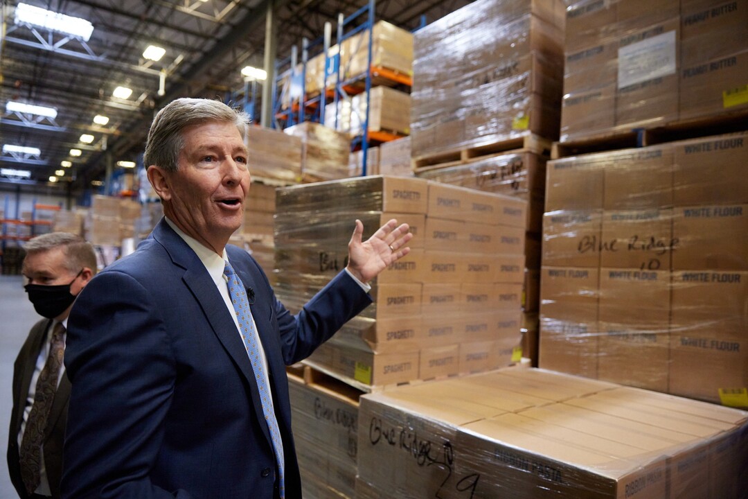 (Photo courtesy of The Church of Jesus Christ of Latter-day Saints) Elder S. Gifford Nielsen, a General Authority Seventy, discusses the partnership with the Black 14 Philanthropy that donated 180 tons of food to nine cities throughout the United States.