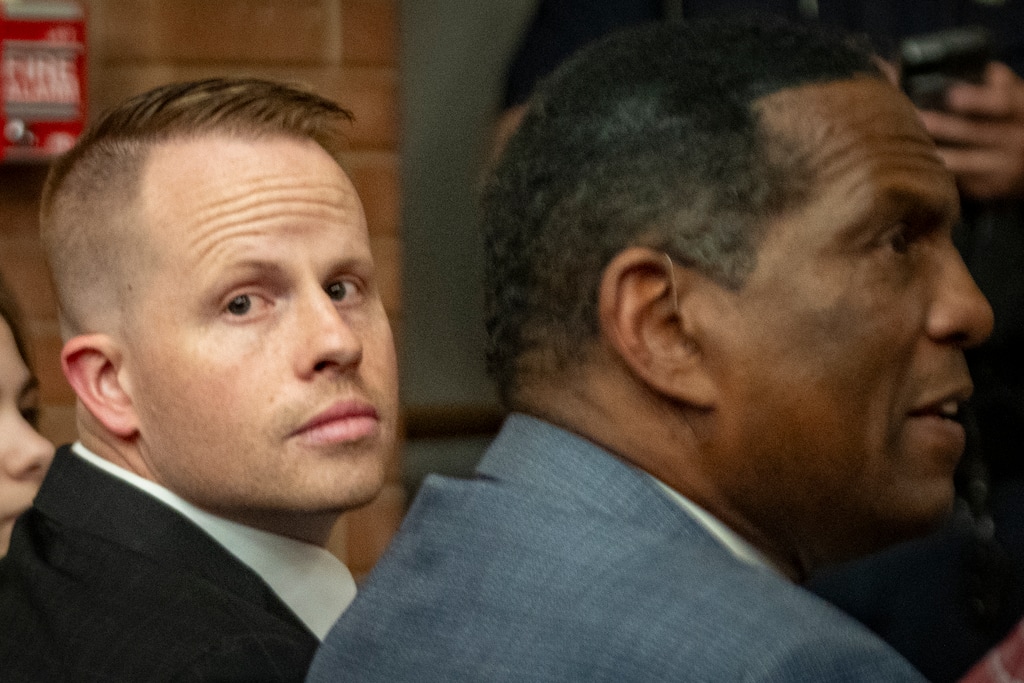(Rick Egan | The Salt Lake Tribune) Rep. Trevor Lee, R-Layton, sits next to Burgess Owens, at a Learning Event sponsored The Utah Republicans at the University of Utah, on Friday, April 10, 2026.
