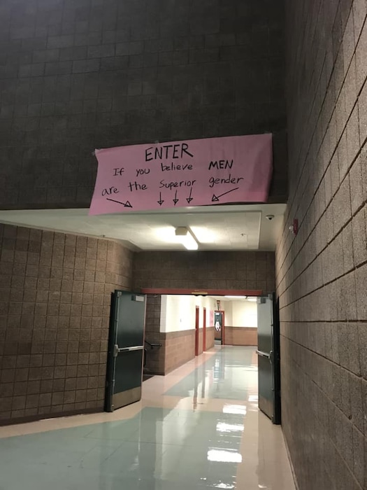 (Photo courtesy of Rik Andes) A banner at Snow Canyon High School cautions students, "Enter if you believe MEN are the superior gender." The sign was one of several that students hung Oct. 22, 2018, in celebration of "Men's Week" at the school, district officials said. The school discontinued its Battle of the Sexes activities — including a "Women's Week" in February — after students and parents complained that the events were reinforcing harmful gender stereotypes.