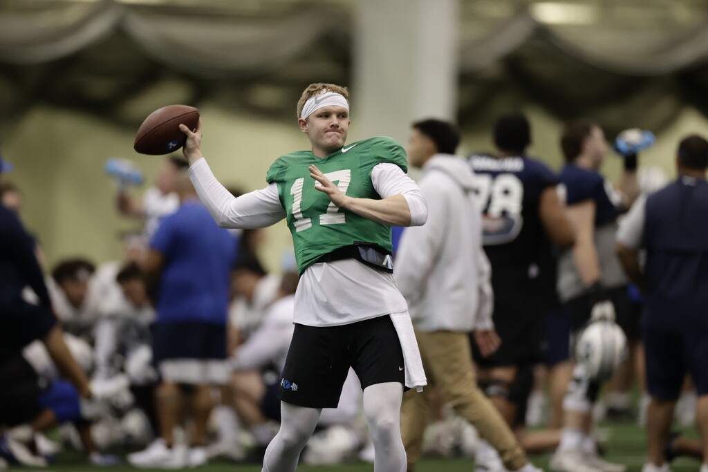 (Ryan Campbell | BYU) Jacob Conover attempts a pass during BYU's spring practice