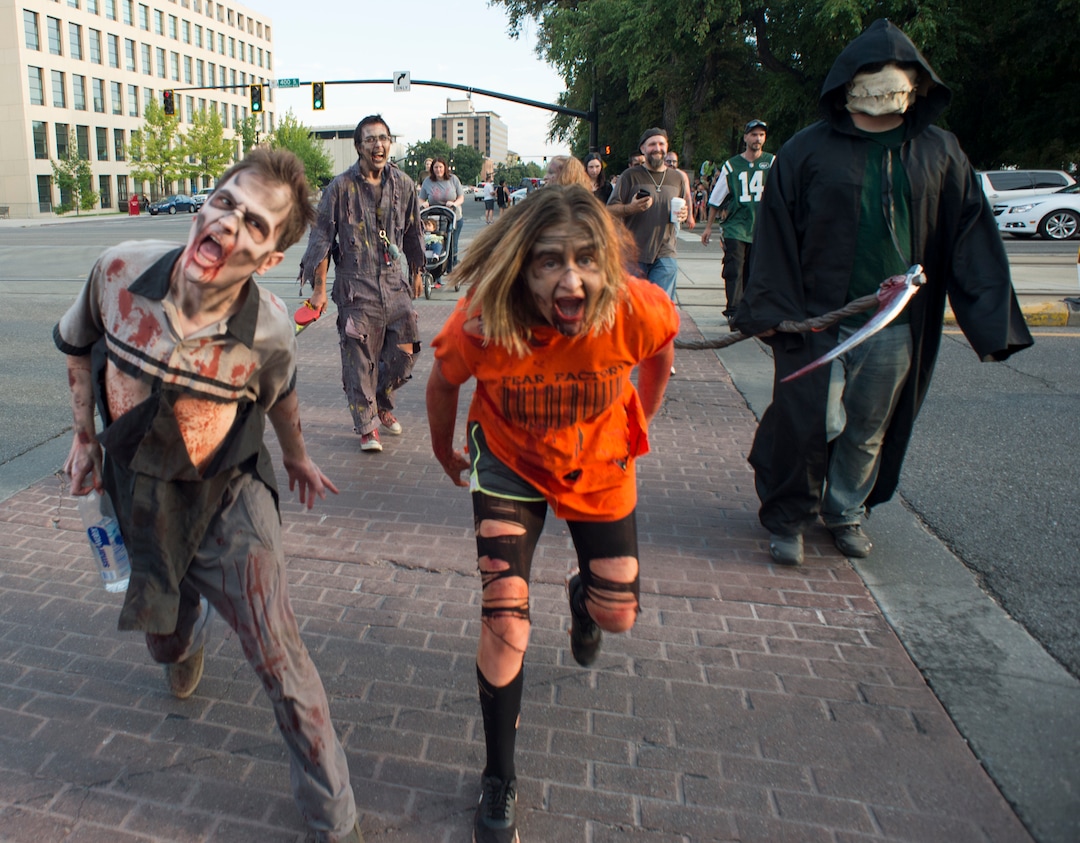    (Rick Egan  |  The Salt Lake Tribune)       Zombies run down 300 East in Salt Lake,  during the 11th annual Salt Lake Zombie Walk, Sunday, Aug. 26, 2018.