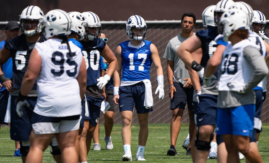 (Francisco Kjolseth | The Salt Lake Tribune) BYU quarter back Jacob Conover, center, takes a turn passing plays as the BYU football team gears up for fall camp on Thursday, Aug. 5, 2021.