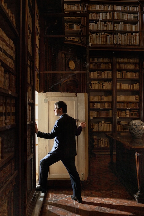 (Alessandro Penso | The New York Times) Christopher Olah, one of Anthropic’s co-founders, who leads the team responsible for understanding why artificial intelligence systems like the company’s Claude act the way they do, at the Lancisiana Library in Rome, May 26, 2026.