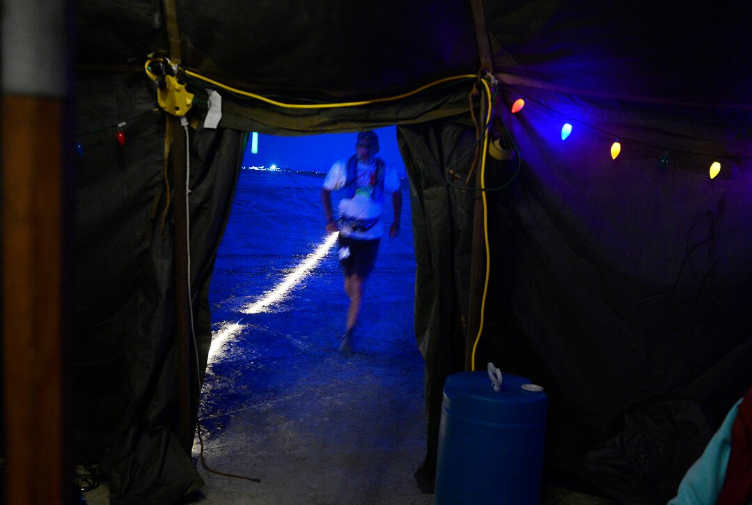 (Scott Sommerdorf | The Salt Lake Tribune)Seventh place finisher Todd Vogel approaches Aid Station 14 - the last checkpoint before the finish line - at the Salt Flats 100 Endurance Run, Saturday, May 5, 2018.